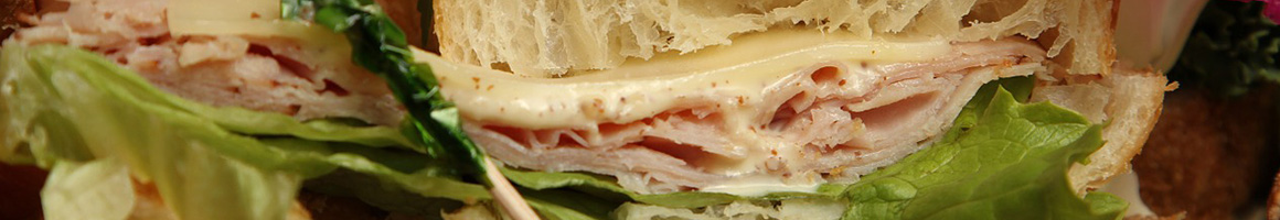 Eating Sandwich at WICHIT Sandwich restaurant in Boston, MA.
